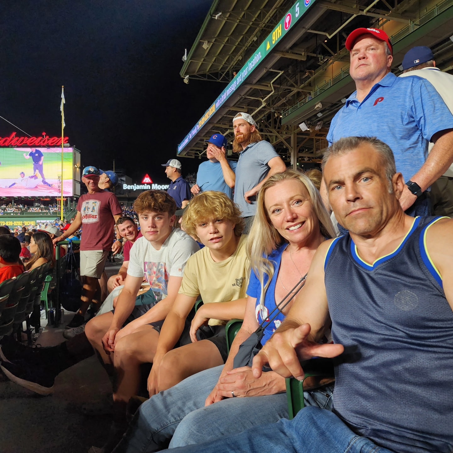 A group sharing an evening at a baseball stadium